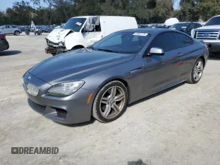 2013 BMW 6 Series 650i with VIN WBAYM9C57DDW20035, listed as a Copart auction lot 47051175 with 96,315 mi miles and Salvage Title. Bid and sale history available at carsss.com. Image 1.