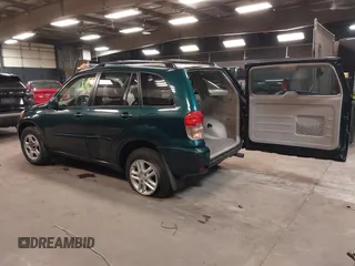 2003 Toyota RAV4 with VIN JTEGH20V130114281, listed as a IAAI auction lot 42144334 with 82,134 mi miles and . Bid and sale history available at carsss.com. Image 3.