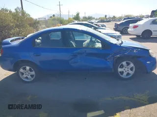 2005 Dodge Neon SXT with VIN 1B3ES56CX5D199994, listed as a IAAI auction lot 42126716 with 187,579 mi miles and . Bid and sale history available at carsss.com. Image 14.
