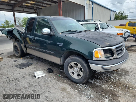 2001 Ford F-150 XL with VIN 1FTRX17L51NA83857, listed as a Copart auction lot 62759145 with 215,961 mi miles and Salvage title. Bid and sale history available at DreamBid. Image 4.