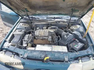 1995 Ford Taurus GL with VIN 1FALP52U2SA113070, listed as a IAAI auction lot 41869576 with 16,935 mi miles and . Bid and sale history available at DreamBid. Image 10.