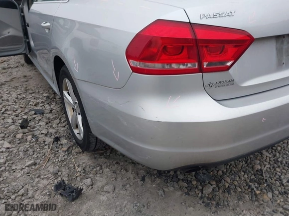 2015 Volkswagen Passat 1.8T Wolfsburg Ed with VIN 1VWAT7A34FC113127, listed as a IAAI auction lot 41211174 with 97,504 mi miles. Bid and sale history available at carsss.com. Image 12.
