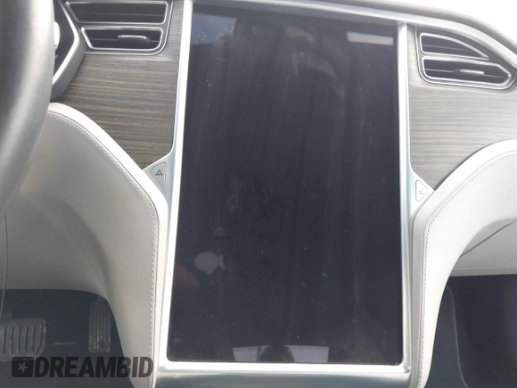 2016 Tesla Model S 70 with VIN 5YJSA1E11GF124965, listed as a IAAI auction lot 41458132 with Not provided miles and . Bid and sale history available at DreamBid. Image 17.