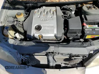2005 Kia Sedona LX with VIN KNDUP132856716343, listed as a Copart auction lot 76028804 with 122,914 mi miles and Salvage Title. Bid and sale history available at carsss.com. Image 12.