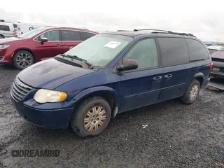 2006 Chrysler Town & Country LX with VIN 2A4GP44R46R800898, listed as a IAAI auction lot 41465720 with 215,423 mi miles and . Bid and sale history available at DreamBid. Image 17.
