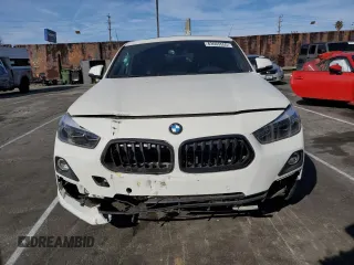 2020 BMW X2 xDrive28i with VIN WBXYJ1C02L5P85780, listed as a Copart auction lot 43665555 with 14,451 mi miles and Salvage Title. Bid and sale history available at carsss.com. Image 5.