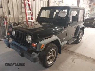 1999 Jeep Wrangler SE with VIN 1J4FY29PXXP409455, listed as a IAAI auction lot 42234313 with 56,252 mi miles and . Bid and sale history available at DreamBid. Image 2.
