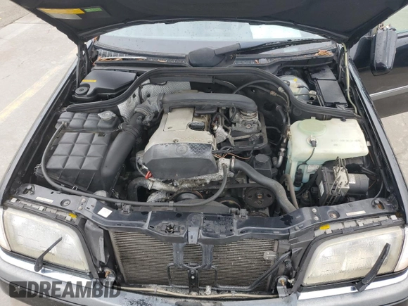 1997 Mercedes-Benz C z VIN WDBHA23EXVF560999, wystawiony jako Copart lot #74100944 z przebiegiem Nie podano mil oraz Nie do naprawy • Non repairable. Historia ofert i sprzedaży dostępna na DreamBid. Obrazek 11.