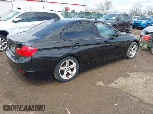 2014 BMW 3 Series 328i xDrive with VIN WBA3B3C58EJ982424, listed as a IAAI auction lot 42075568 with 190,009 mi miles. Bid and sale history available at carsss.com. Image 4.