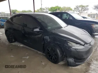 2022 Tesla Model Y Long Range z VIN 7SAYGDEE1NF393187, wystawiony jako Copart lot #56419535 z przebiegiem 82 757 mil mil oraz Nie do naprawy • Non repairable. Historia ofert i sprzedaży dostępna na DreamBid. Obrazek 4.