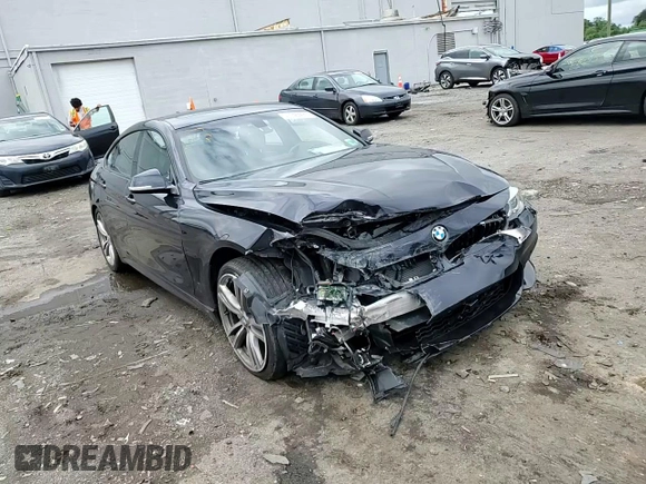 2015 BMW 4 Series 435i with VIN WBA4B1C56FD955408, listed as a Copart auction lot 57146495 with 81,258 mi miles and Salvage title. Bid and sale history available at DreamBid. Image 13.