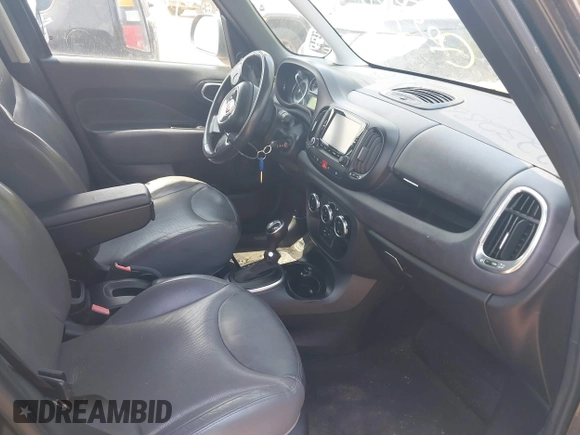 2014 FIAT 500L Lounge with VIN ZFBCFACH1EZ003031, listed as a IAAI auction lot 42232861 with 104,496 mi miles and . Bid and sale history available at DreamBid. Image 5.
