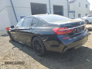2017 BMW 7 Series 740e xDrive iPerformance with VIN WBA7J2C32HG497906, listed as a Copart auction lot 68861214 with 0 mi miles and Salvage Title. Bid and sale history available at carsss.com. Image 2.