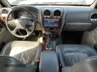 2003 GMC Envoy SLT z VIN 1GKET16PX36243554, wystawiony jako Copart lot #49083975 z przebiegiem 148 596 mil mil oraz Szkoda całkowita • Salvage title. Historia ofert i sprzedaży dostępna na DreamBid. Obrazek 8.