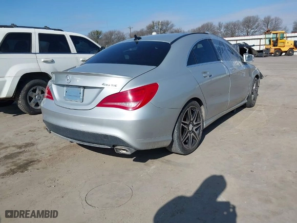 2014 Mercedes-Benz CLA-Class CLA 250 with VIN WDDSJ4GB8EN098151, listed as a IAAI auction lot 41592910 with 76,765 mi miles. Bid and sale history available at carsss.com. Image 4.