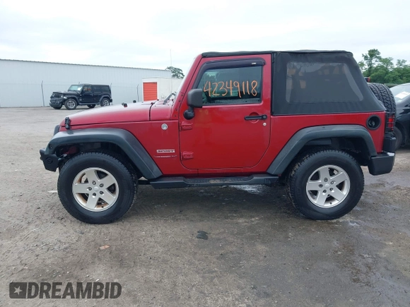 2012 Jeep Wrangler Sport with VIN 1C4AJWAG3CL197295, listed as a IAAI auction lot 42349118 with 117,381 mi miles and . Bid and sale history available at DreamBid. Image 14.