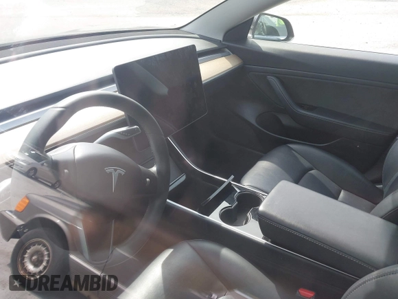 2020 Tesla Model 3 Standard Range Plus with VIN 5YJ3E1EAXLF643807, listed as a IAAI auction lot 41789406 with 49,256 mi miles. Bid and sale history available at carsss.com. Image 17.