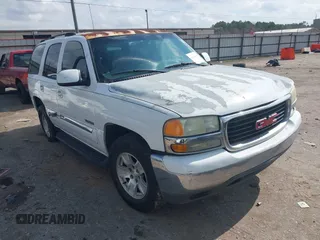 2004 GMC Yukon SLT with VIN 1GKEC13V14J273866, listed as a IAAI auction lot 41512337 with 252,702 mi miles. Bid and sale history available at carsss.com. Image 1.