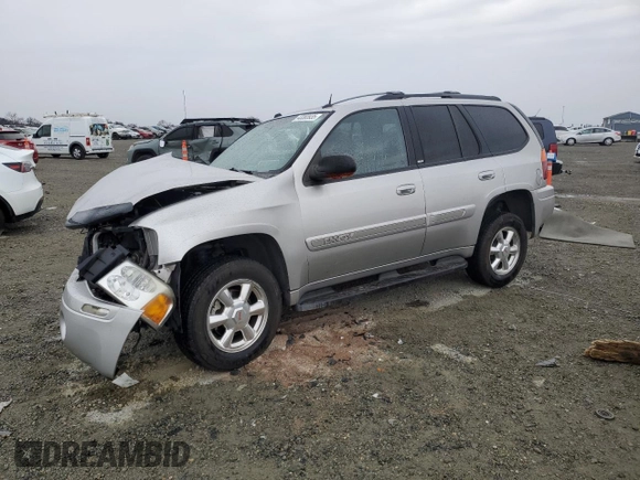 2004 GMC Envoy SLE with VIN 1GKDS13S142358446, listed as a Copart auction lot 43383935 with 154,358 mi miles and Salvage Title. Bid and sale history available at carsss.com. Image 1.