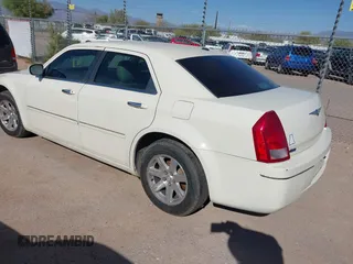 2007 Chrysler 300 Limited with VIN 2C3KA53G27H794893, listed as a IAAI auction lot 41851619 with 129,338 mi miles. Bid and sale history available at carsss.com. Image 3.