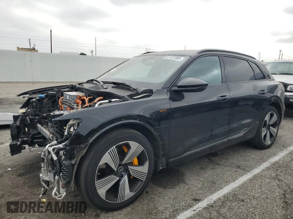 2022 Audi e-tron Premium Plus with VIN WA1LAAGE4NB014605, listed as a Copart auction lot 61127385 with 26,355 mi miles and Salvage title. Bid and sale history available at DreamBid. Image 1.