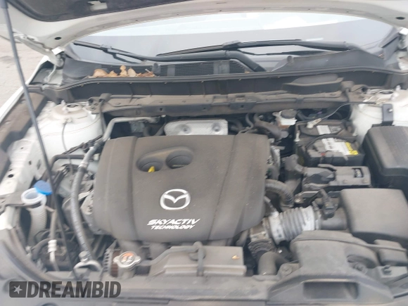 2017 Mazda CX-5 Touring with VIN JM3KFACL5H0189296, listed as a IAAI auction lot 42042328 with 60,208 mi miles and . Bid and sale history available at carsss.com. Image 10.