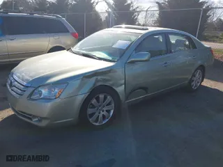 2006 Toyota Avalon XL with VIN 4T1BK36B06U160311, listed as a IAAI auction lot 41865587 with 93,301 mi miles. Bid and sale history available at carsss.com. Image 2.