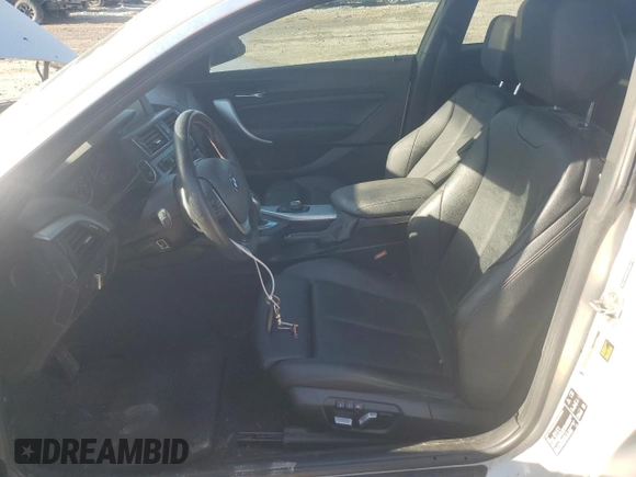 2016 BMW 2 Series 228i xDrive with VIN WBA1G9C55GV599175, listed as a Copart auction lot 44058195 with 106,544 mi miles and Salvage title. Bid and sale history available at DreamBid. Image 7.