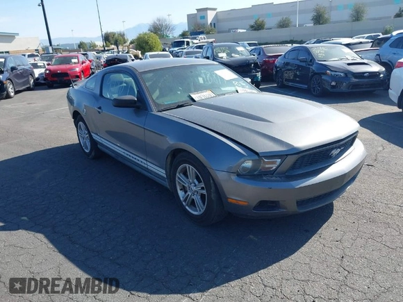 2012 Ford Mustang V6 Premium with VIN 1ZVBP8AM8C5265077, listed as a IAAI auction lot 41899887 with 139,915 mi miles. Bid and sale history available at carsss.com. Image 1.