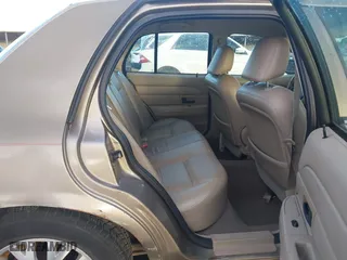 2005 Ford Crown Victoria LX with VIN 2FAFP74W55X130190, listed as a IAAI auction lot 41138306 with 122,738 mi miles. Bid and sale history available at carsss.com. Image 8.
