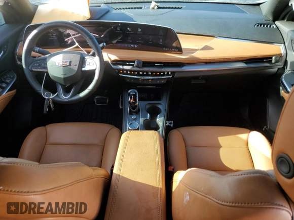 2024 Cadillac XT4 FWD Sport with VIN 1GYFZER40RF249101, listed as a Copart auction lot 76312304 with 1,969 mi miles and Salvage title. Bid and sale history available at DreamBid. Image 8.