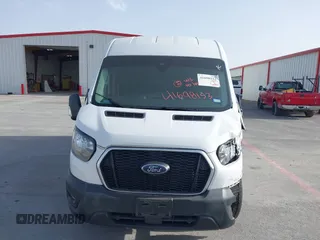 2023 Ford Transit Cargo with VIN 1FTBR1C85PKA32611, listed as a IAAI auction lot 41698153 with 25,010 mi miles and . Bid and sale history available at carsss.com. Image 12.