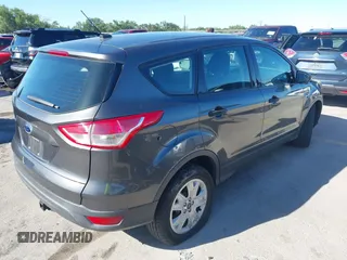 2015 Ford Escape S with VIN 1FMCU0F77FUA91187, listed as a IAAI auction lot 42088797 with 113,863 mi miles. Bid and sale history available at carsss.com. Image 4.