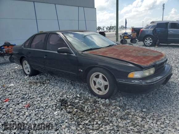 1995 Chevrolet Caprice with VIN 1G1BL52P7SR182763, listed as a Copart auction lot 55635055 with Not Provided miles and Clean Title. Bid and sale history available at DreamBid. Image 4.