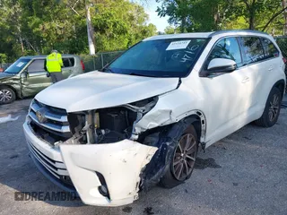 2018 Toyota Highlander SE with VIN 5TDKZRFH6JS534716, listed as a IAAI auction lot 42554743 with 154,636 mi miles and . Bid and sale history available at DreamBid. Image 6.