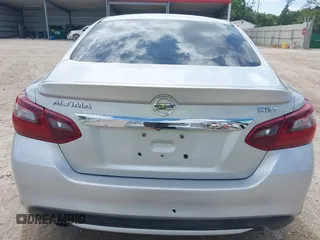 2017 Nissan Altima S z VIN 1N4AL3AP7HC275003, wystawiony jako IAAI lot #42420564 z przebiegiem 127 566 mil mil oraz . Historia ofert i sprzedaży dostępna na DreamBid. Obrazek 17.