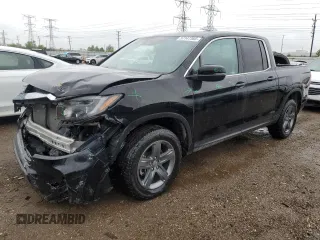2023 Honda Ridgeline RTL with VIN 5FPYK3F59PB001216, listed as a Copart auction lot 57147385 with 43,452 mi miles and Salvage title. Bid and sale history available at DreamBid. Image 1.