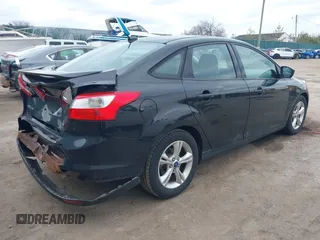 2012 Ford Focus SE with VIN 1FAHP3F25CL446064, listed as a IAAI auction lot 41883353 with 142,468 mi miles. Bid and sale history available at carsss.com. Image 4.