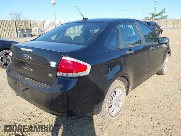2009 Ford Focus SE with VIN 1FAHP35N29W246035, listed as a IAAI auction lot 42041059 with 146,416 mi miles. Bid and sale history available at carsss.com. Image 4.
