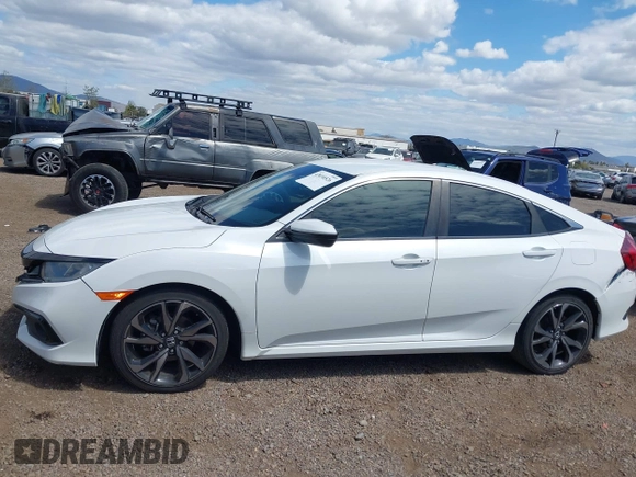 2019 Honda Civic Sport with VIN 2HGFC2F85KH600037, listed as a IAAI auction lot 42030526 with 82,821 mi miles and . Bid and sale history available at DreamBid. Image 14.