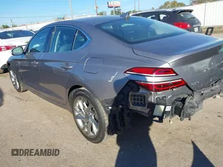 2022 Genesis G70 2.0T with VIN KMTG34TA9NU093023, listed as a IAAI auction lot 40989282 with 50,036 mi miles. Bid and sale history available at carsss.com. Image 3.