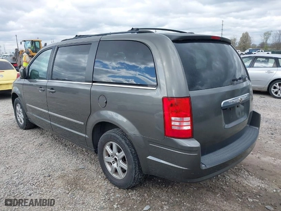 2010 Chrysler Town & Country Touring with VIN 2A4RR5D11AR194116, listed as a IAAI auction lot 42025043 with 197,826 mi miles. Bid and sale history available at carsss.com. Image 3.