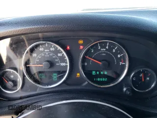 2013 Jeep Wrangler Unlimited Moab with VIN 1C4HJWEG7DL600043, listed as a Copart auction lot 52146945 with 118,882 mi miles and Salvage title. Bid and sale history available at DreamBid. Image 9.