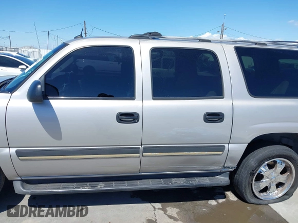 2005 Chevrolet Suburban LT with VIN 3GNEC16Z35G104209, listed as a IAAI auction lot 41946436 with 204,543 mi miles and . Bid and sale history available at DreamBid. Image 13.