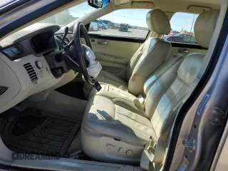 2009 Cadillac DTS 1SA z VIN 1G6KD57Y69U126507, wystawiony jako Copart lot #48392775 z przebiegiem 152 637 mil mil oraz Szkoda całkowita • Salvage title. Historia ofert i sprzedaży dostępna na DreamBid. Obrazek 7.