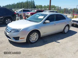 2012 Ford Fusion Hybrid z VIN 3FADP0L3XCR380817, wystawiony jako IAAI lot #42755712 z przebiegiem 81 220 mil mil oraz . Historia ofert i sprzedaży dostępna na DreamBid. Obrazek 2.