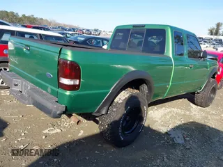 1999 Ford Ranger XLT with VIN 1FTZR15X3XPA13058, listed as a IAAI auction lot 41329263 with 96,926 mi miles and . Bid and sale history available at DreamBid. Image 4.