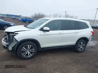 2018 Honda Pilot EX-L with VIN 5FNYF6H52JB053046, listed as a IAAI auction lot 42013210 with 103,721 mi miles. Bid and sale history available at carsss.com. Image 14.
