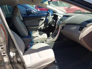 2013 Hyundai Elantra GLS z VIN 5NPDH4AE4DH440405, wystawiony jako IAAI lot #41901236 z przebiegiem 122 375 mil mil oraz . Historia ofert i sprzedaży dostępna na DreamBid. Obrazek 5.