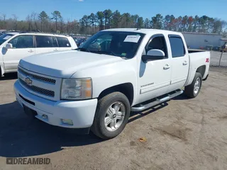 2010 Chevrolet Silverado 1500 LT with VIN 3GCRKSE35AG262187, listed as a IAAI auction lot 41883053 with 156,505 mi miles. Bid and sale history available at carsss.com. Image 17.